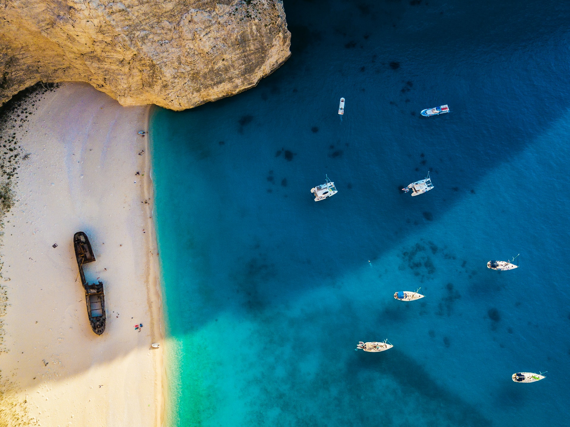 blue water and sand on Greek beach