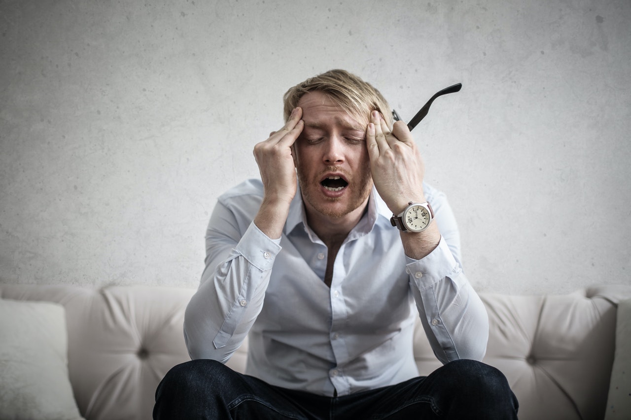 man sitting in distress