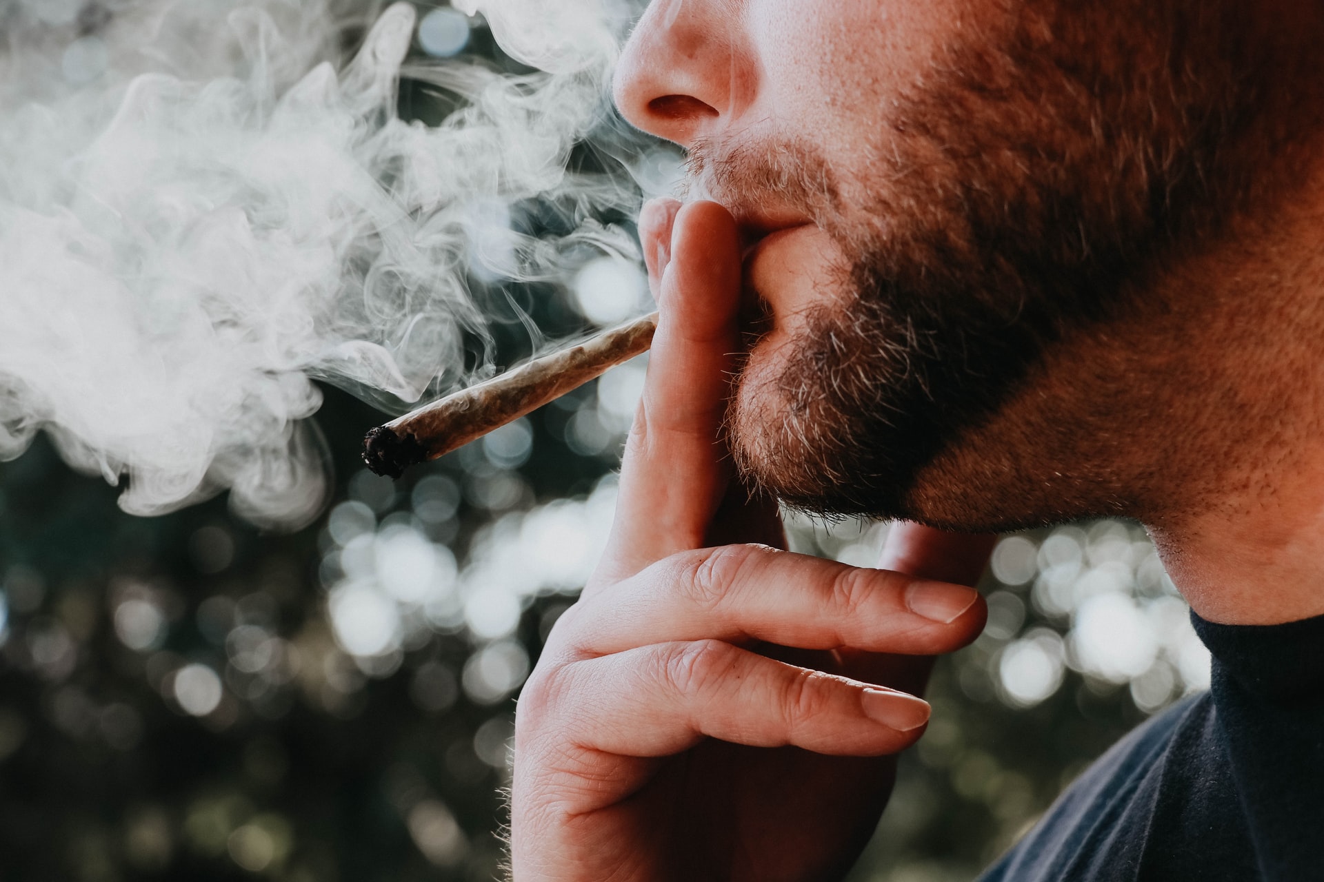 man smoking weed