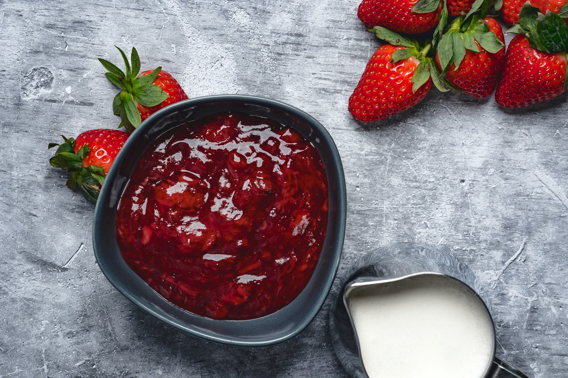 pot of strawberry jam and cream