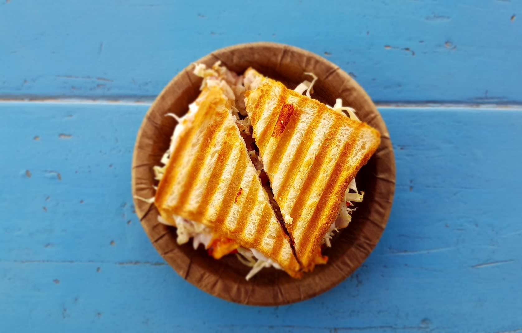 sandwich on a blue table