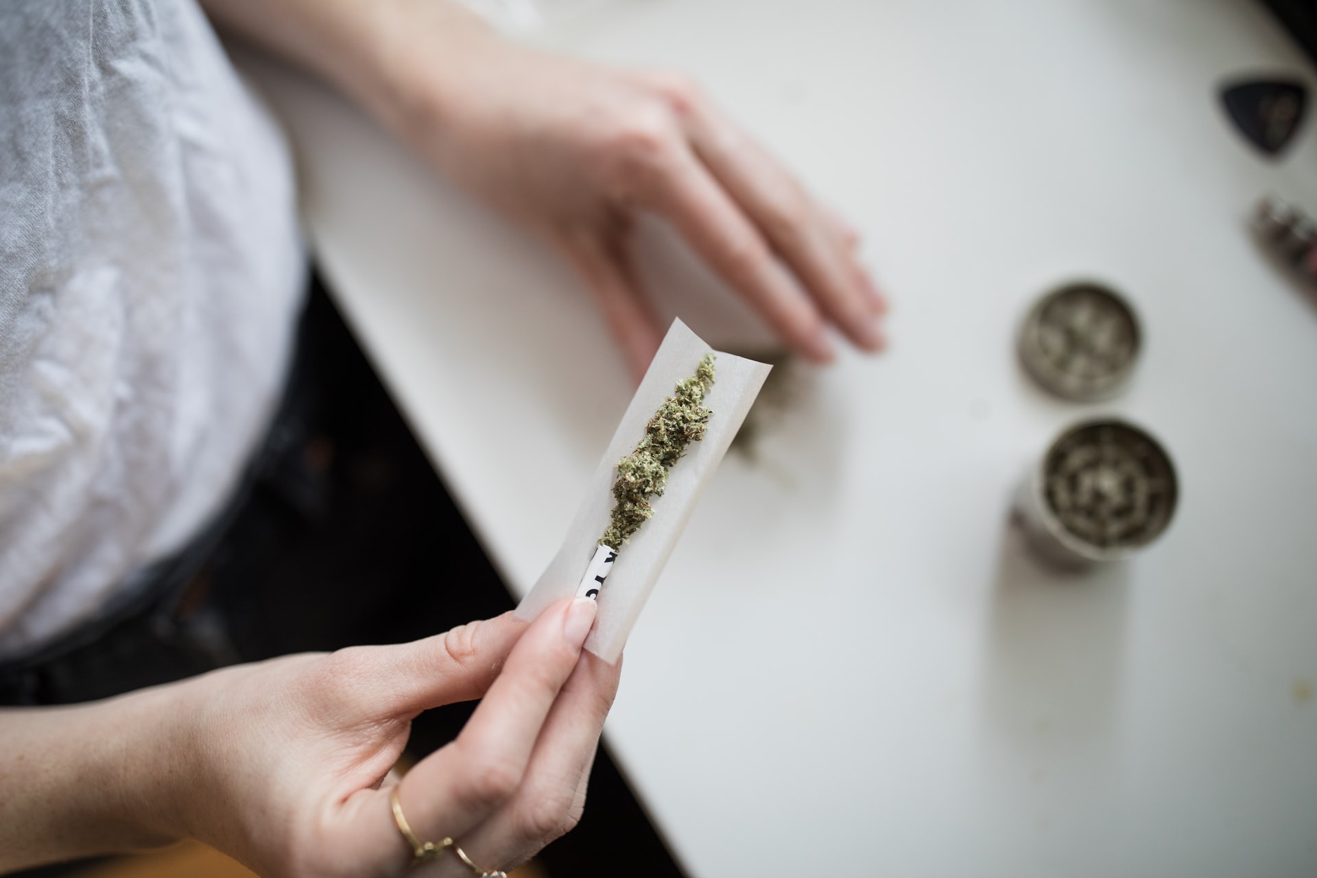 someone rolling a joint