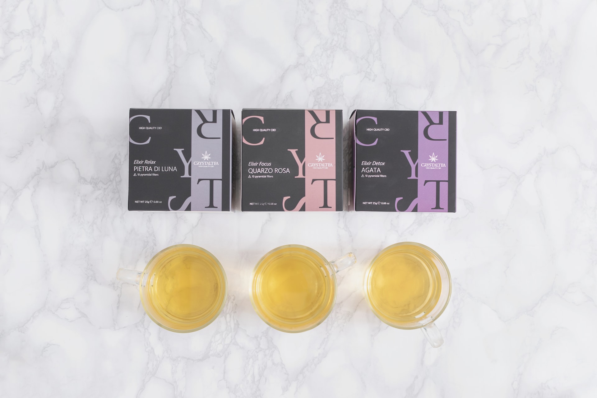 three cannabis tea glasses in a row
